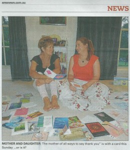Sharon Halliday from the Ask Sharon of The Area News is pictured with her mum, Jan Donges and their collection of Mothers Day cards