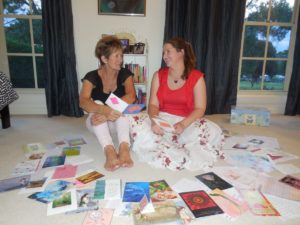 podcaster-and-author-Sharon-Halliday-with-her-mother-Jan-Donges-working on-Postcards-from-the-Heart-book